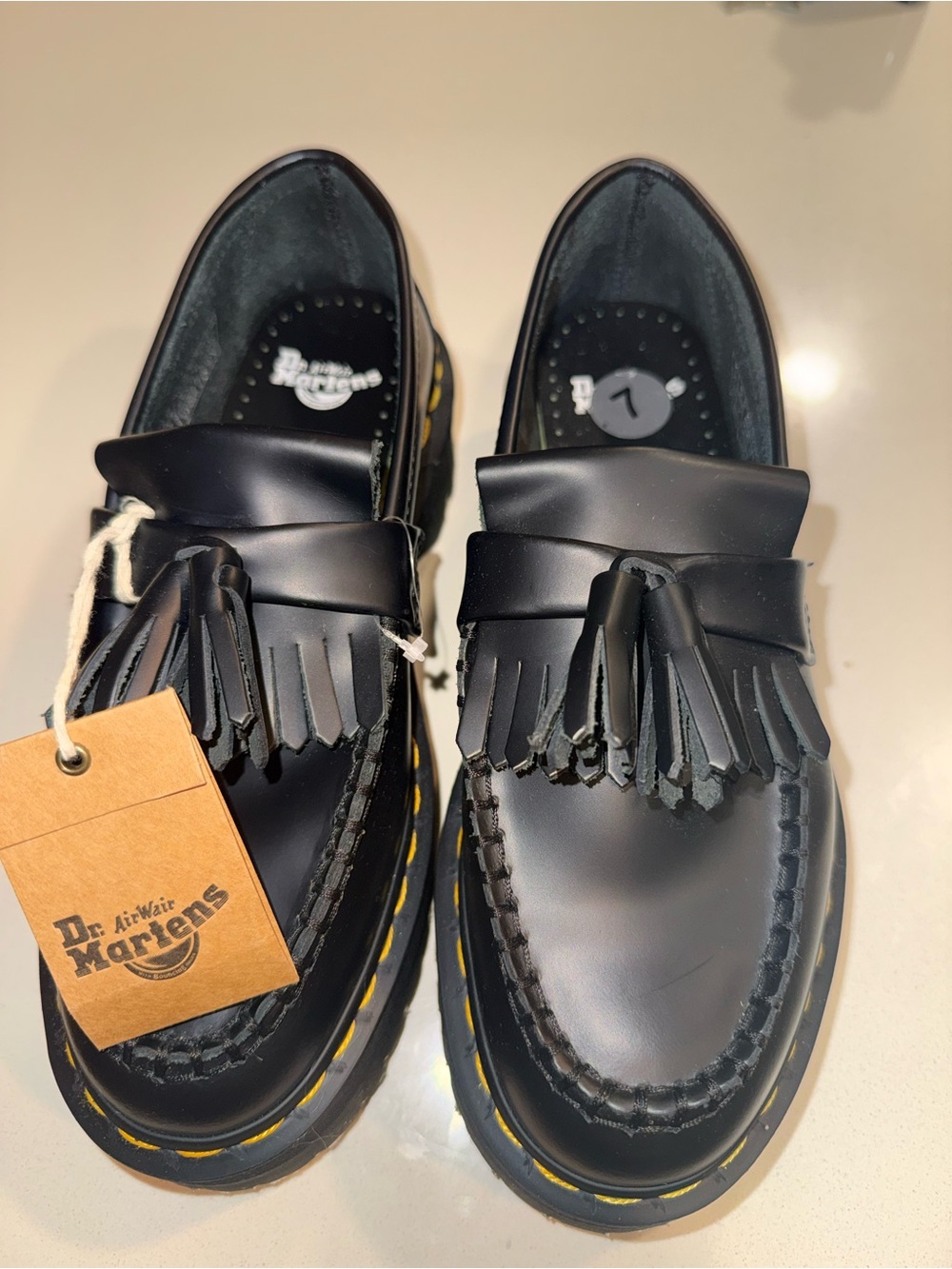 Dr. Martens Black Leather Tassel Kiltie Loafers with Yellow Stitching